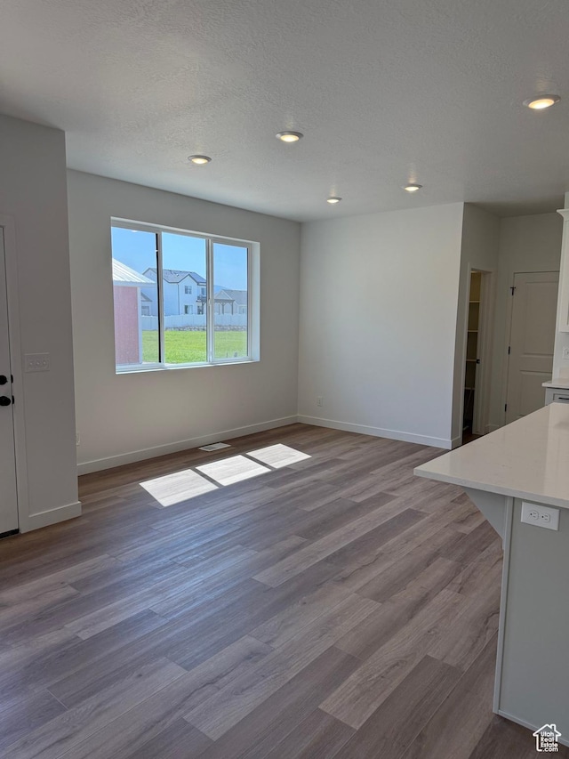 274 N 825 W, Clearfield, UT 84015 - unfurnished living room featuring wood finished floors and recessed lighting