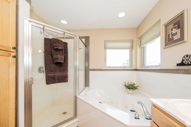 3520 W 2600 N, Plain City, UT 84404 - bathroom with a stall shower, a jetted tub, vanity, and recessed lighting