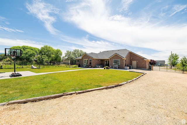 3520 W 2600 N, Plain City, UT 84404 - ranch-style house with a patio area, driveway, and brick siding