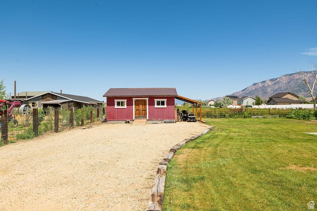 3520 W 2600 N, Plain City, UT 84404 - rear view of house featuring an outbuilding and a mountain view