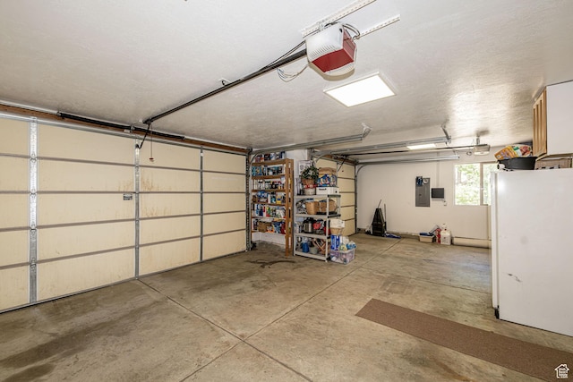 3520 W 2600 N, Plain City, UT 84404 - garage with freestanding refrigerator and a garage door opener