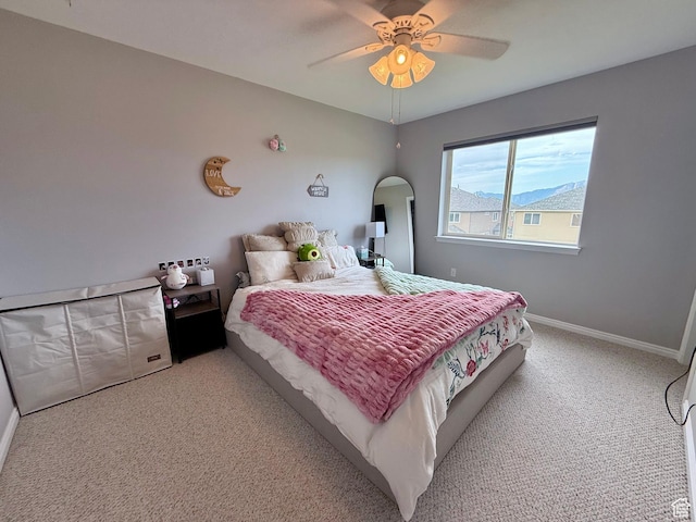 7089 S Brittany Town Dr, West Jordan, UT 84084 - carpeted bedroom with arched walkways and ceiling fan