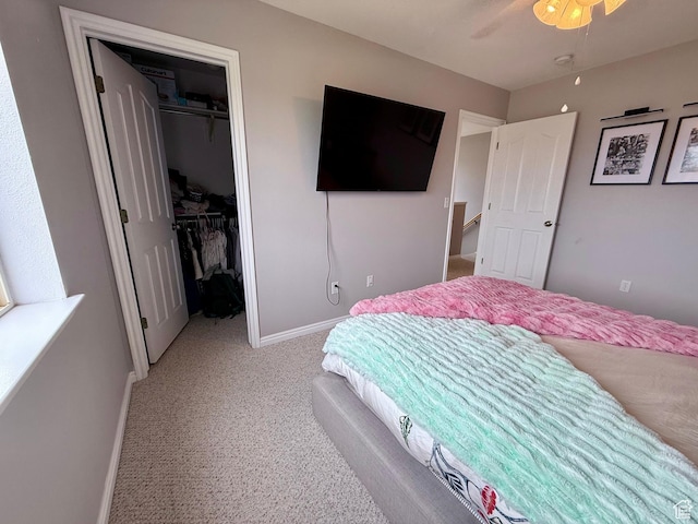 7089 S Brittany Town Dr, West Jordan, UT 84084 - bedroom featuring light carpet, a walk in closet, a closet, and ceiling fan