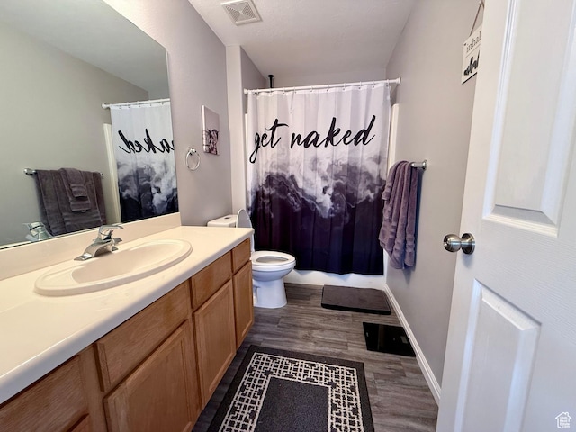 7089 S Brittany Town Dr, West Jordan, UT 84084 - bathroom with vanity, wood finished floors, and a shower with curtain