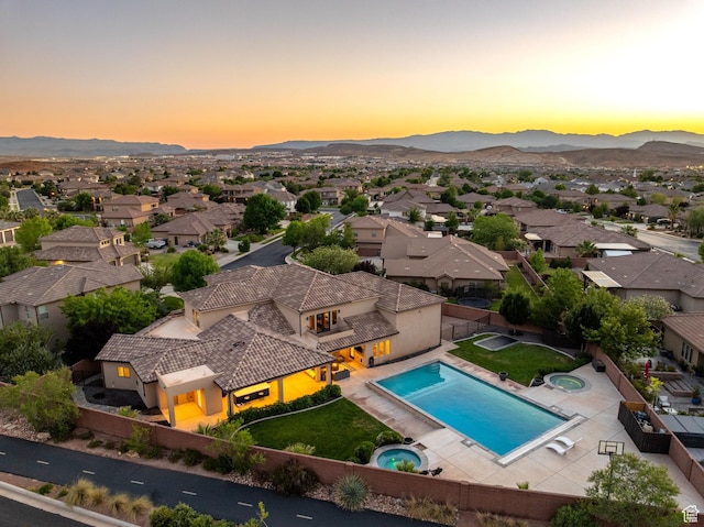 2979 E 3610th Cir S, St George, UT 84790 - aerial view at dusk of a mountain view, a residential view, and view of pool area