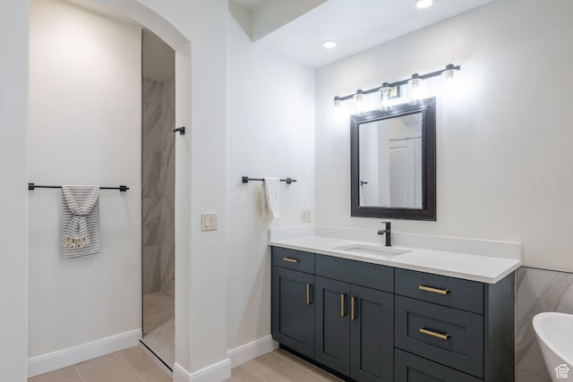2979 E 3610th Cir S, St George, UT 84790 - bathroom featuring a tile shower, vanity, tile patterned floors, a freestanding bath, and recessed lighting