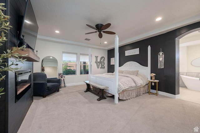 2979 E 3610th Cir S, St George, UT 84790 - bedroom featuring light carpet, recessed lighting, arched walkways, connected bathroom, and ceiling fan