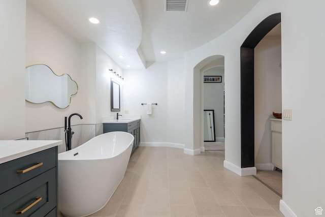 2979 E 3610th Cir S, St George, UT 84790 - bathroom featuring a freestanding tub, vanity, recessed lighting, and tile patterned flooring