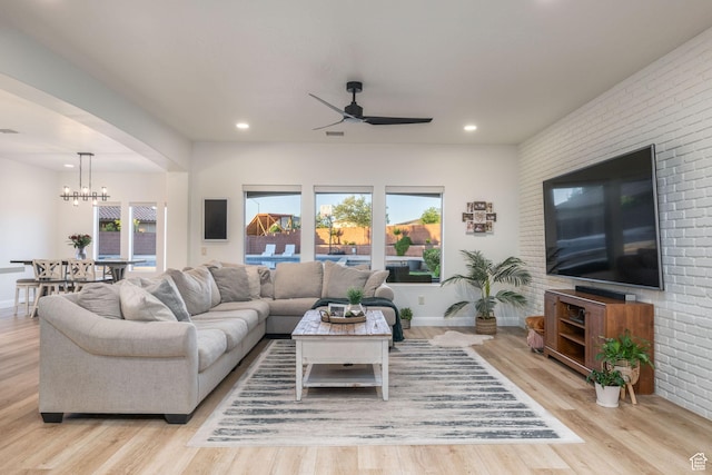 2979 E 3610th Cir S, St George, UT 84790 - living area with a ceiling fan, a chandelier, healthy amount of natural light, light wood finished floors, and recessed lighting