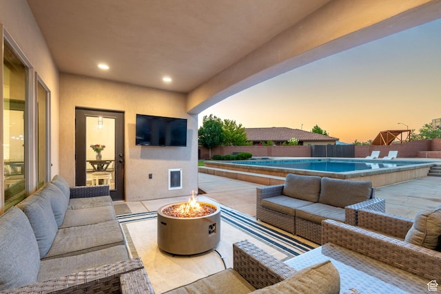 2979 E 3610th Cir S, St George, UT 84790 - fenced backyard featuring an outdoor living space with a fire pit and a patio area