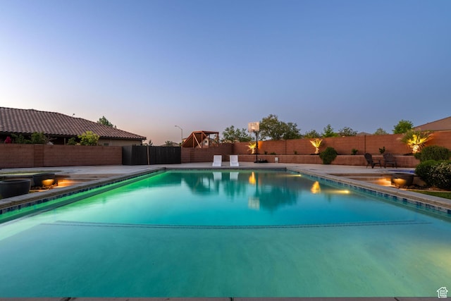 2979 E 3610th Cir S, St George, UT 84790 - pool at dusk with a fenced backyard and a patio