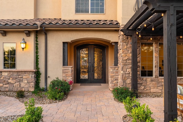 2979 E 3610th Cir S, St George, UT 84790 - doorway to property featuring french doors, stone siding, and stucco siding