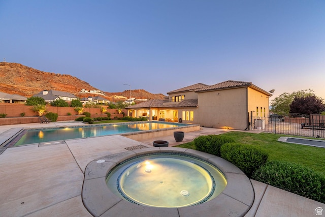 2979 E 3610th Cir S, St George, UT 84790 - view of pool featuring an in-ground hot tub, a fenced backyard, a patio, and a mountain view