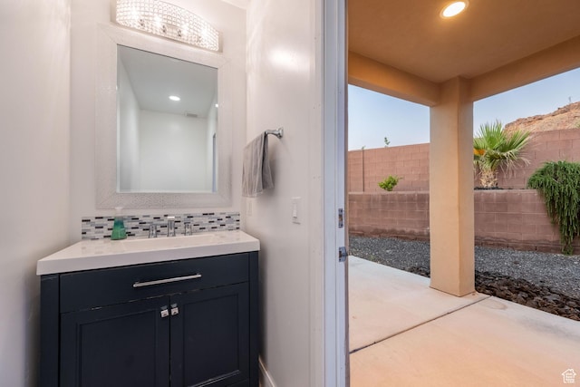 2979 E 3610th Cir S, St George, UT 84790 - bathroom with vanity, tasteful backsplash, and recessed lighting