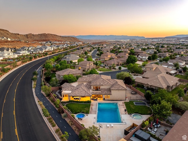 2979 E 3610th Cir S, St George, UT 84790 - aerial view at dusk of view of pool, a residential view, and a mountain view
