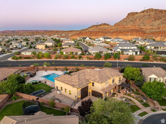 2979 E 3610th Cir S, St George, UT 84790 - aerial perspective of suburban area with a mountain backdrop and a pool area