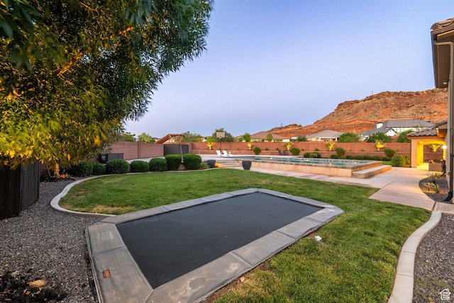 2979 E 3610th Cir S, St George, UT 84790 - fenced backyard featuring a mountain view and a patio area