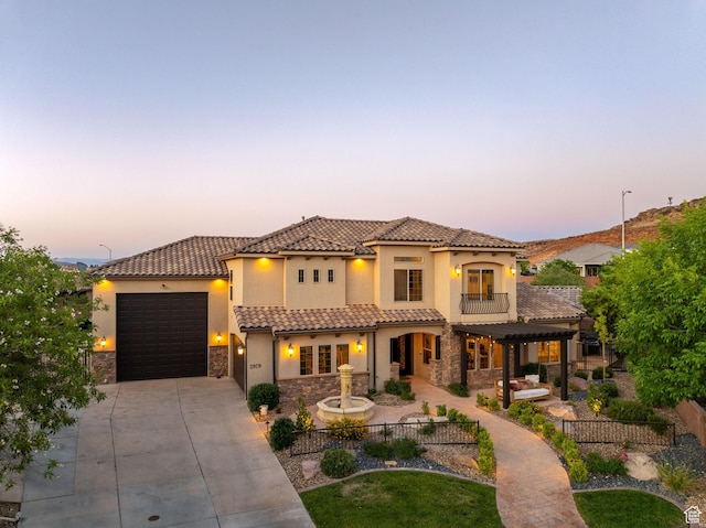 2979 E 3610th Cir S, St George, UT 84790 - mediterranean / spanish home with stone siding, driveway, a balcony, and stucco siding