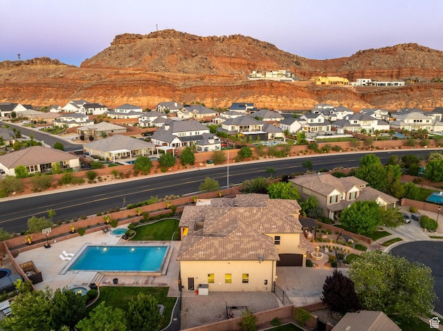 2979 E 3610th Cir S, St George, UT 84790 - aerial view at dusk of a mountain view, a residential view, and view of pool area