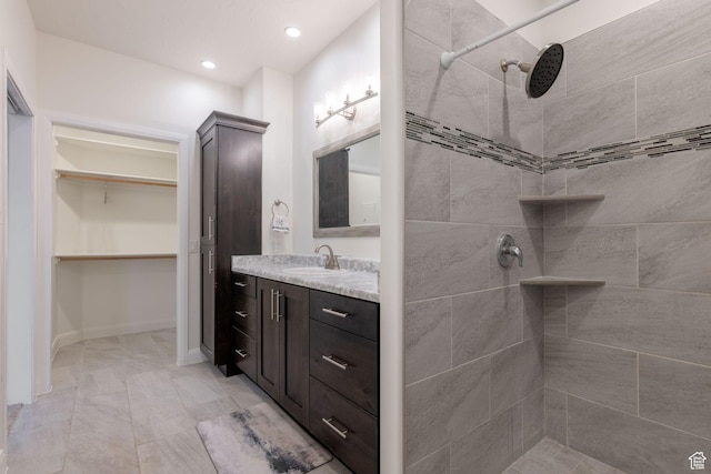 2979 E 3610th Cir S, St George, UT 84790 - full bath with a tile shower, vanity, a spacious closet, and recessed lighting