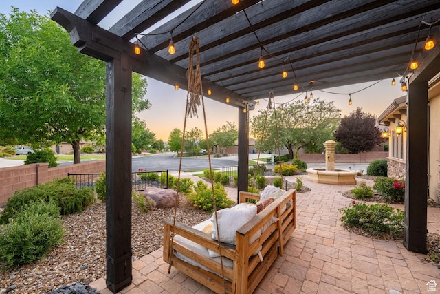 2979 E 3610th Cir S, St George, UT 84790 - patio terrace at dusk featuring a patio area and a pergola