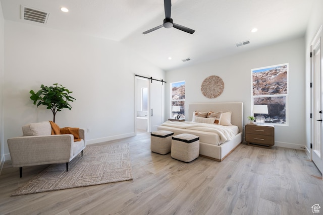 794 S 1690 W, Hurricane, UT 84737 - bedroom featuring a barn door, light wood finished floors, a ceiling fan, recessed lighting, and vaulted ceiling