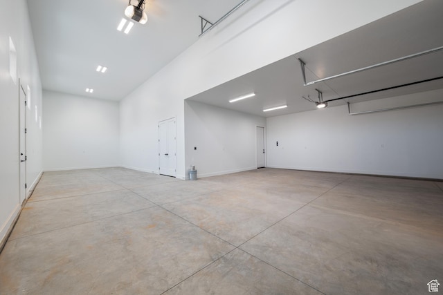 794 S 1690 W, Hurricane, UT 84737 - garage featuring a garage door opener and baseboards