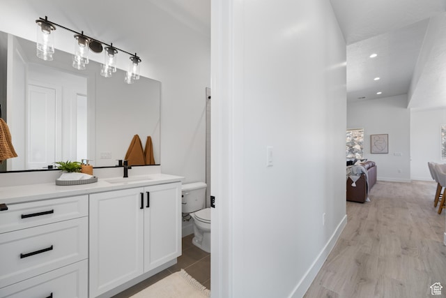 794 S 1690 W, Hurricane, UT 84737 - ensuite bathroom featuring vanity, recessed lighting, and wood finished floors
