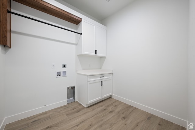 794 S 1690 W, Hurricane, UT 84737 - laundry room with hookup for an electric dryer, light wood-type flooring, washer hookup, and cabinet space
