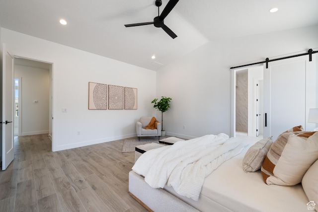 794 S 1690 W, Hurricane, UT 84737 - bedroom with a barn door, vaulted ceiling, recessed lighting, light wood-style flooring, and a ceiling fan