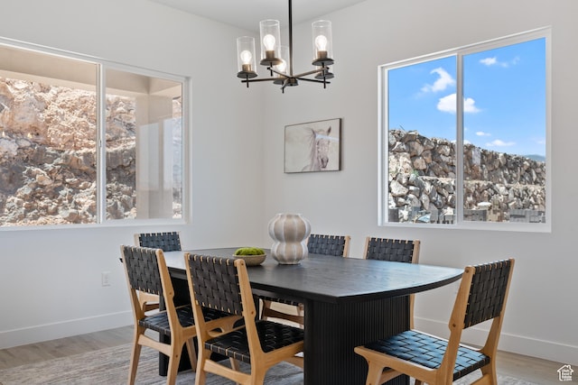 794 S 1690 W, Hurricane, UT 84737 - dining space featuring a chandelier, wood finished floors, and plenty of natural light