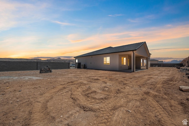 794 S 1690 W, Hurricane, UT 84737 - rear view of property with stucco siding and a patio