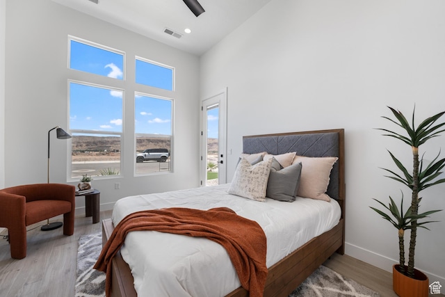 794 S 1690 W, Hurricane, UT 84737 - bedroom featuring multiple windows, wood finished floors, a high ceiling, a ceiling fan, and recessed lighting