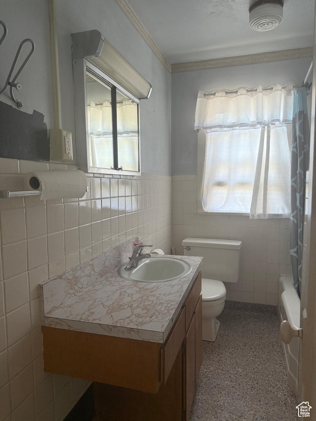 286 Duchesne St, Helper, UT 84526 - full bathroom featuring tile walls, plenty of natural light, vanity, speckled floor, and shower / bath combination with curtain
