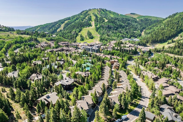 7560 Ridge Dr Unit 10, Park City, UT 84060 - aerial perspective of suburban area featuring a mountain backdrop and a heavily wooded area