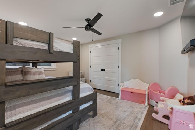 11422 N Vantage Ln Unit 69, Hideout, UT 84036 - bedroom with wood finished floors, recessed lighting, ceiling fan, and a closet
