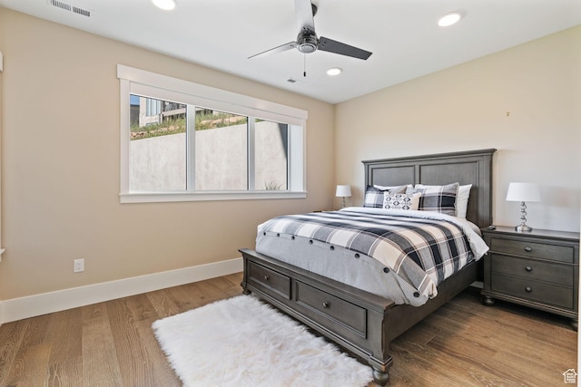 11422 N Vantage Ln Unit 69, Hideout, UT 84036 - bedroom with wood finished floors, recessed lighting, and a ceiling fan