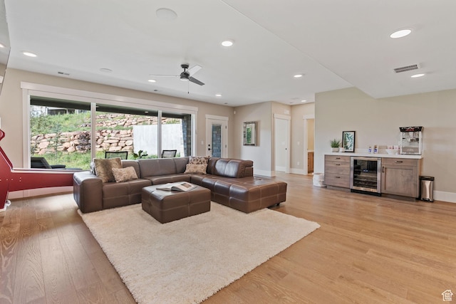 11422 N Vantage Ln Unit 69, Hideout, UT 84036 - living room with beverage cooler, light wood-style floors, ceiling fan, recessed lighting, and a dry bar