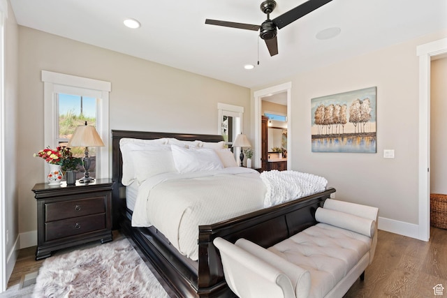 11422 N Vantage Ln Unit 69, Hideout, UT 84036 - bedroom with light wood finished floors, a ceiling fan, and recessed lighting