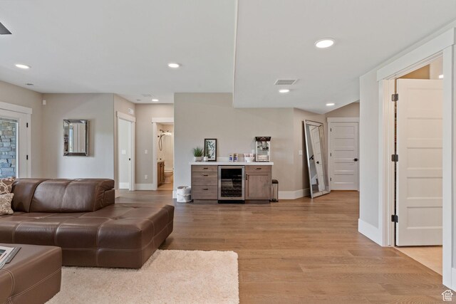 11422 N Vantage Ln Unit 69, Hideout, UT 84036 - living room with beverage cooler, light wood-type flooring, and recessed lighting