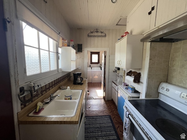 72 W 200 N, Price, UT 84501 - kitchen featuring white range with electric stovetop, under cabinet range hood, washer and clothes dryer, wood ceiling, and light countertops