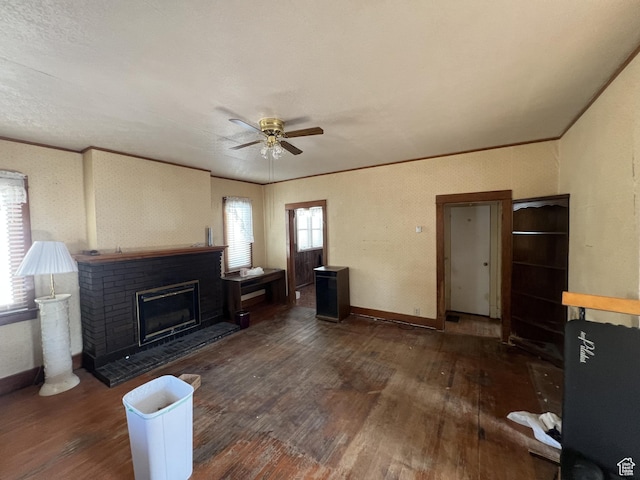 72 W 200 N, Price, UT 84501 - living area with hardwood / wood-style flooring, ceiling fan, plenty of natural light, a brick fireplace, and ornamental molding
