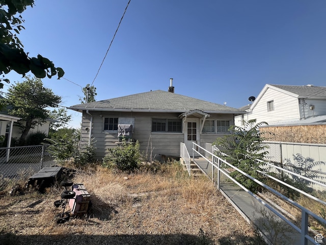72 W 200 N, Price, UT 84501 - rear view of house with roof with shingles and a chimney