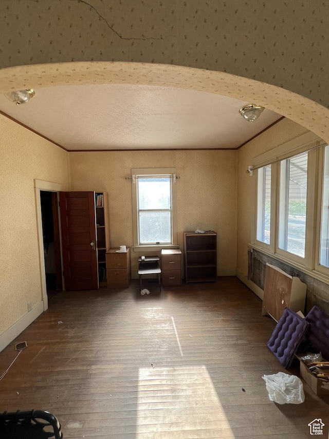 72 W 200 N, Price, UT 84501 - spare room featuring wood-type flooring and wallpapered walls