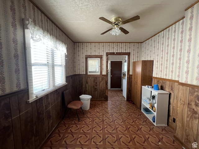72 W 200 N, Price, UT 84501 - hallway featuring a wainscoted wall, healthy amount of natural light, wood walls, and a textured ceiling