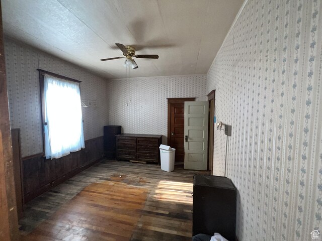 72 W 200 N, Price, UT 84501 - bedroom with wood finished floors, wallpapered walls, and ceiling fan