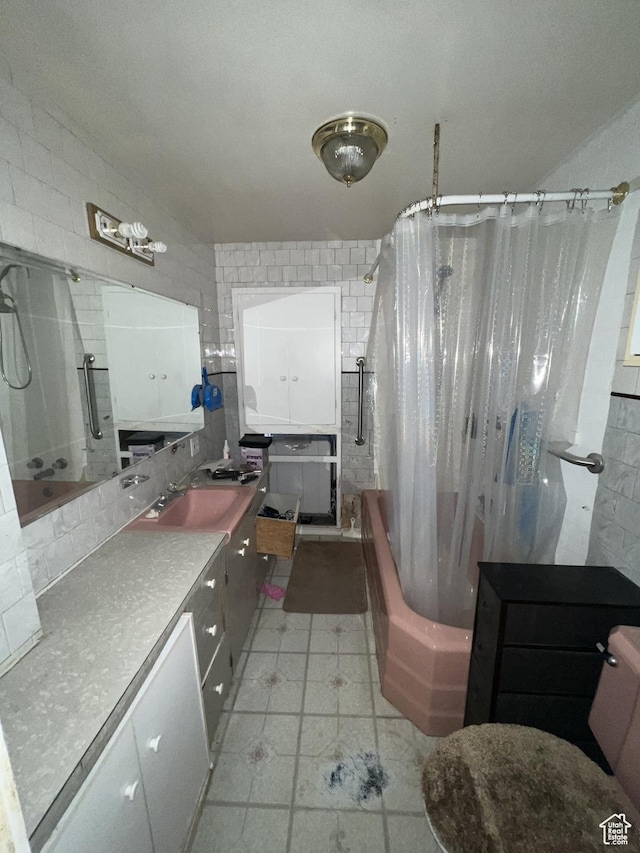 72 W 200 N, Price, UT 84501 - full bath featuring tile walls, vanity, shower / bath combo with shower curtain, and decorative backsplash