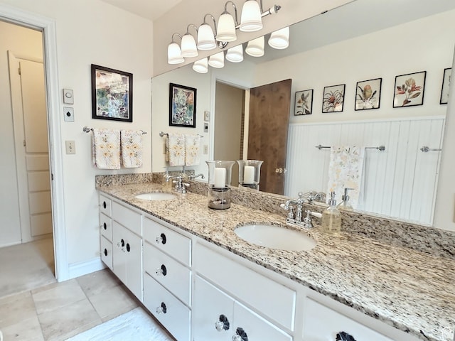 1425 W Main St, Vernal, UT 84078 - bathroom featuring double vanity and baseboards