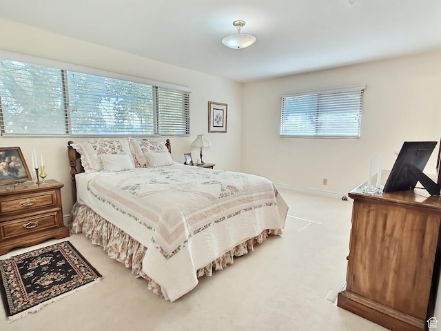 1425 W Main St, Vernal, UT 84078 - bedroom featuring multiple windows and carpet flooring