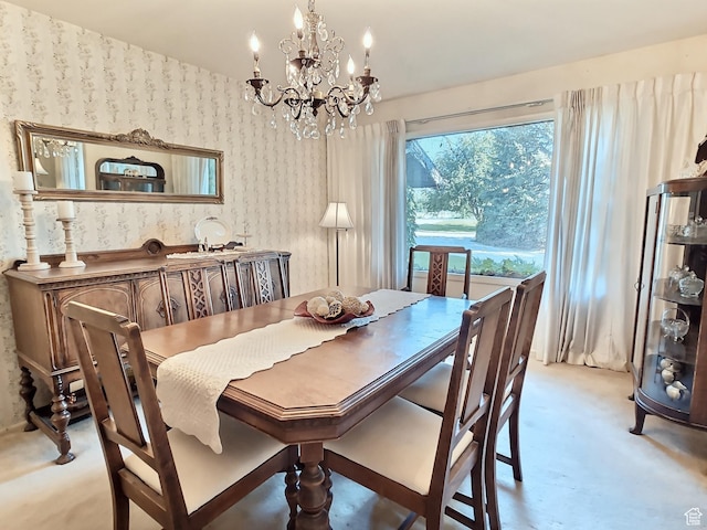 1425 W Main St, Vernal, UT 84078 - dining space with wallpapered walls, a chandelier, and light colored carpet